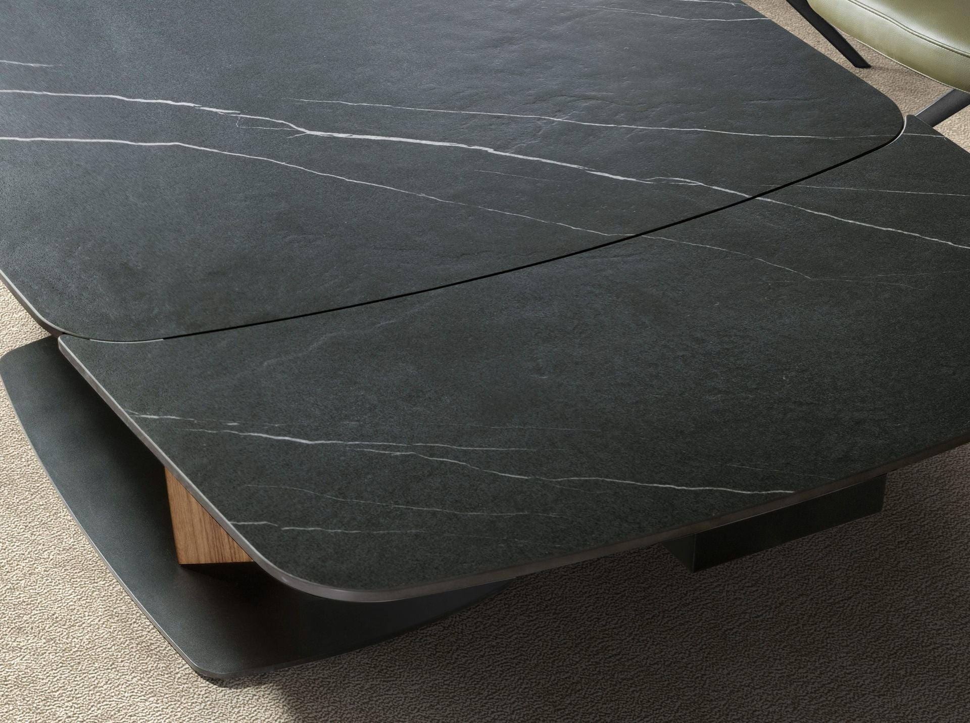 Extendable oval dining table with porcelain marble and walnut base