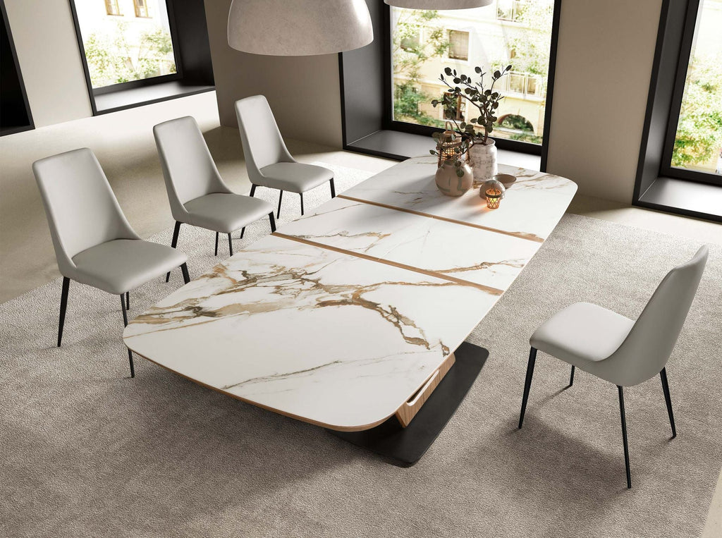 Extendable oval dining table with porcelain marble and walnut base