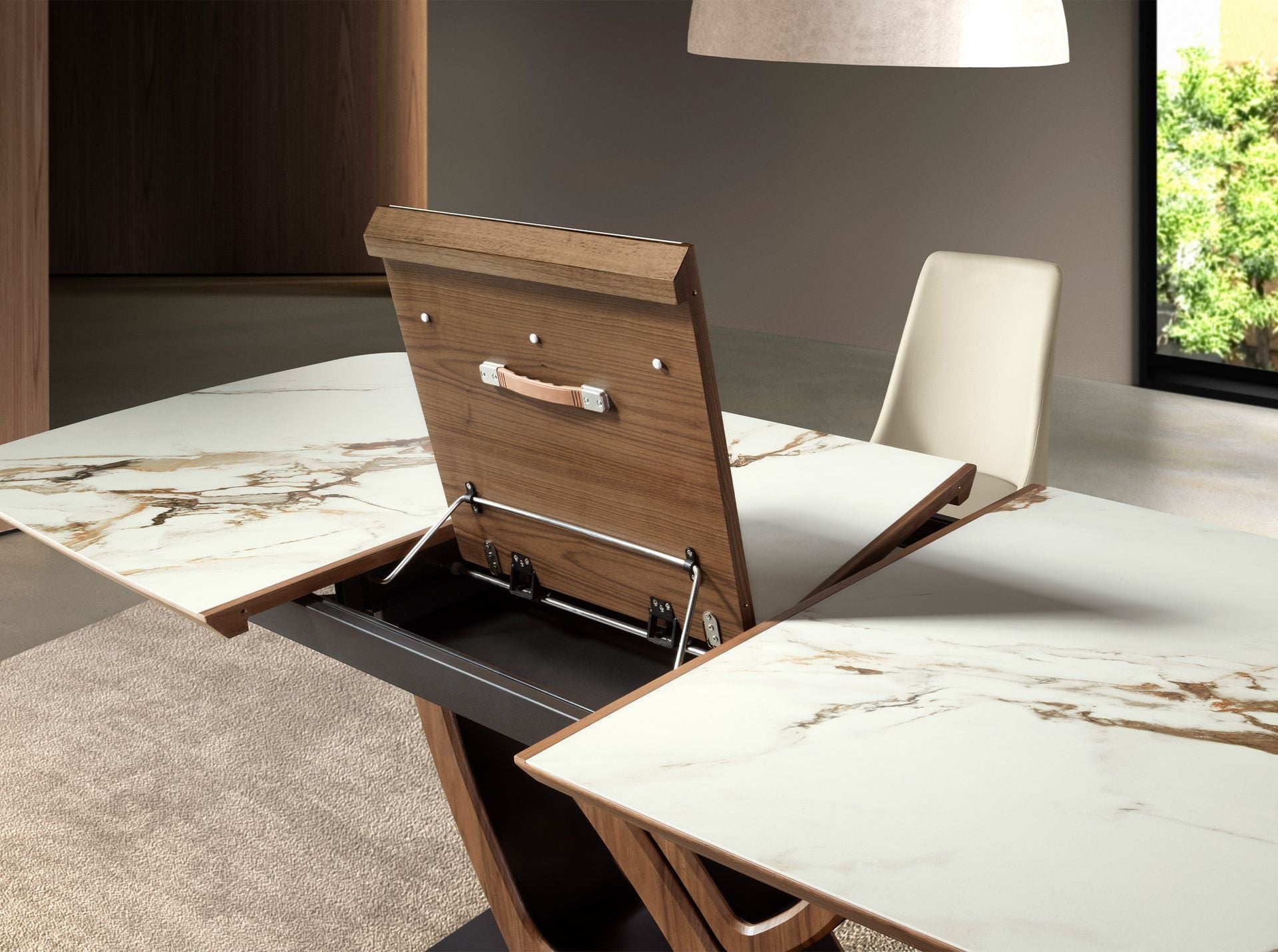 Extendable oval dining table with porcelain marble and walnut base