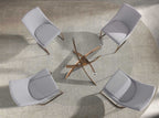 Tempered glass and pink steel round dining table