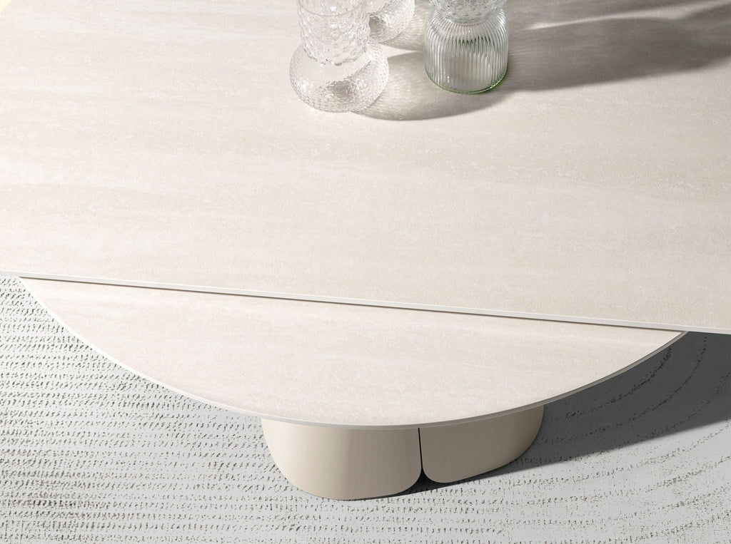 Round extendable dining table in porcelain stoneware and sand-colored steel