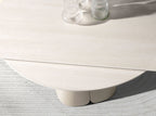 Round extendable dining table in porcelain stoneware and sand-colored steel