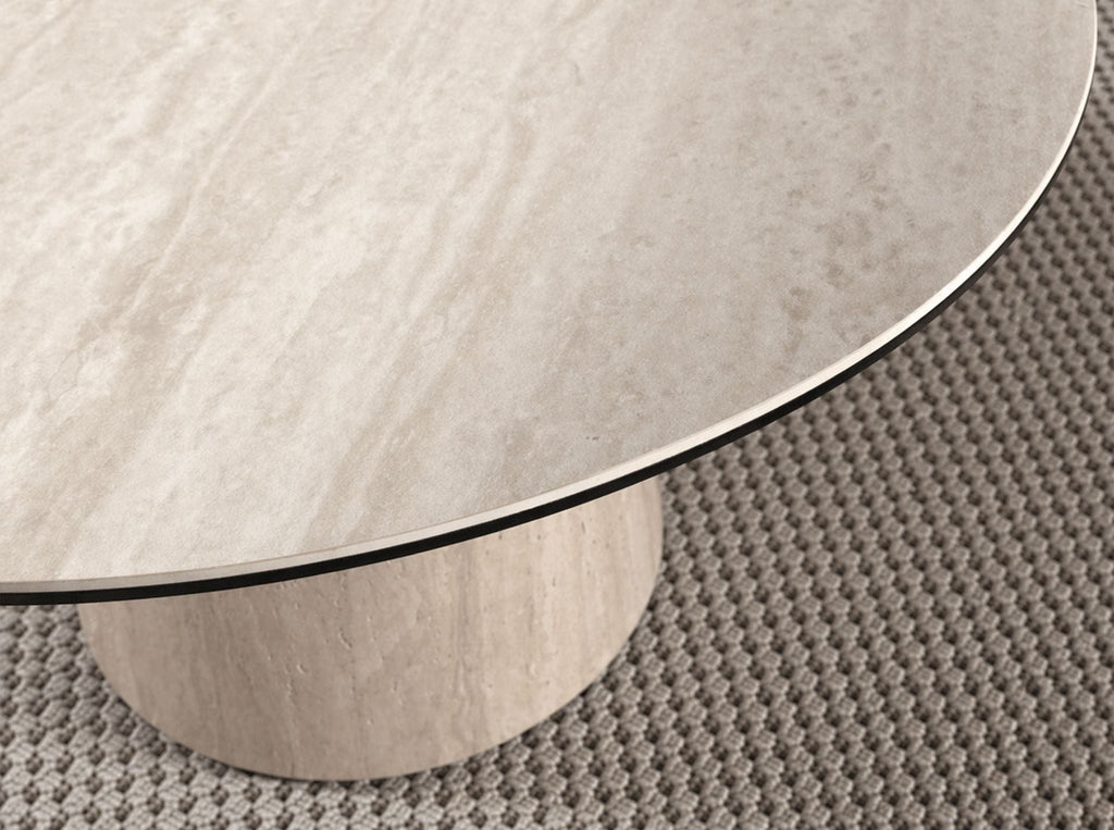 Round dining table in porcelain stoneware and wood clad with a flexible porcelain stoneware laminate