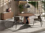 Round dining table in walnut and black epoxy steel