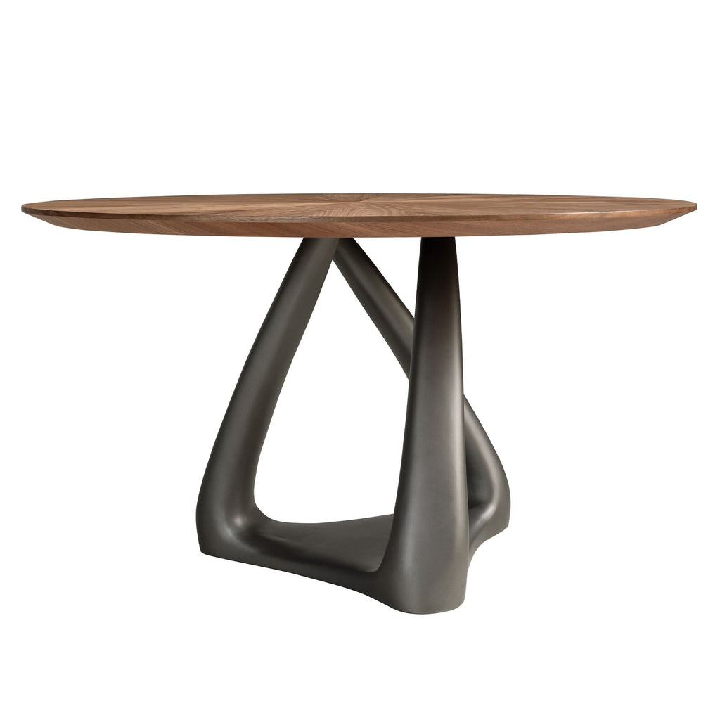 Round dining table in walnut, dark gray fiberglass and metal