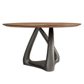 Round dining table in walnut, dark gray fiberglass and metal