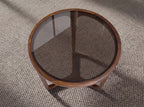 Round coffee table in smoked brown glass and walnut