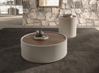 Round coffee table in walnut and sand-colored faux leather-covered wood
