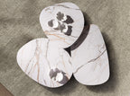 Organic-shaped living room coffee table in porcelain marble and walnut