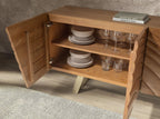 Sideboard in light walnut and polished gold-coloured steel
