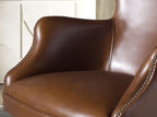 Dark brown leather swivel armchair