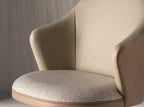 Swivel stool in mottled cream fabric and brown faux leather