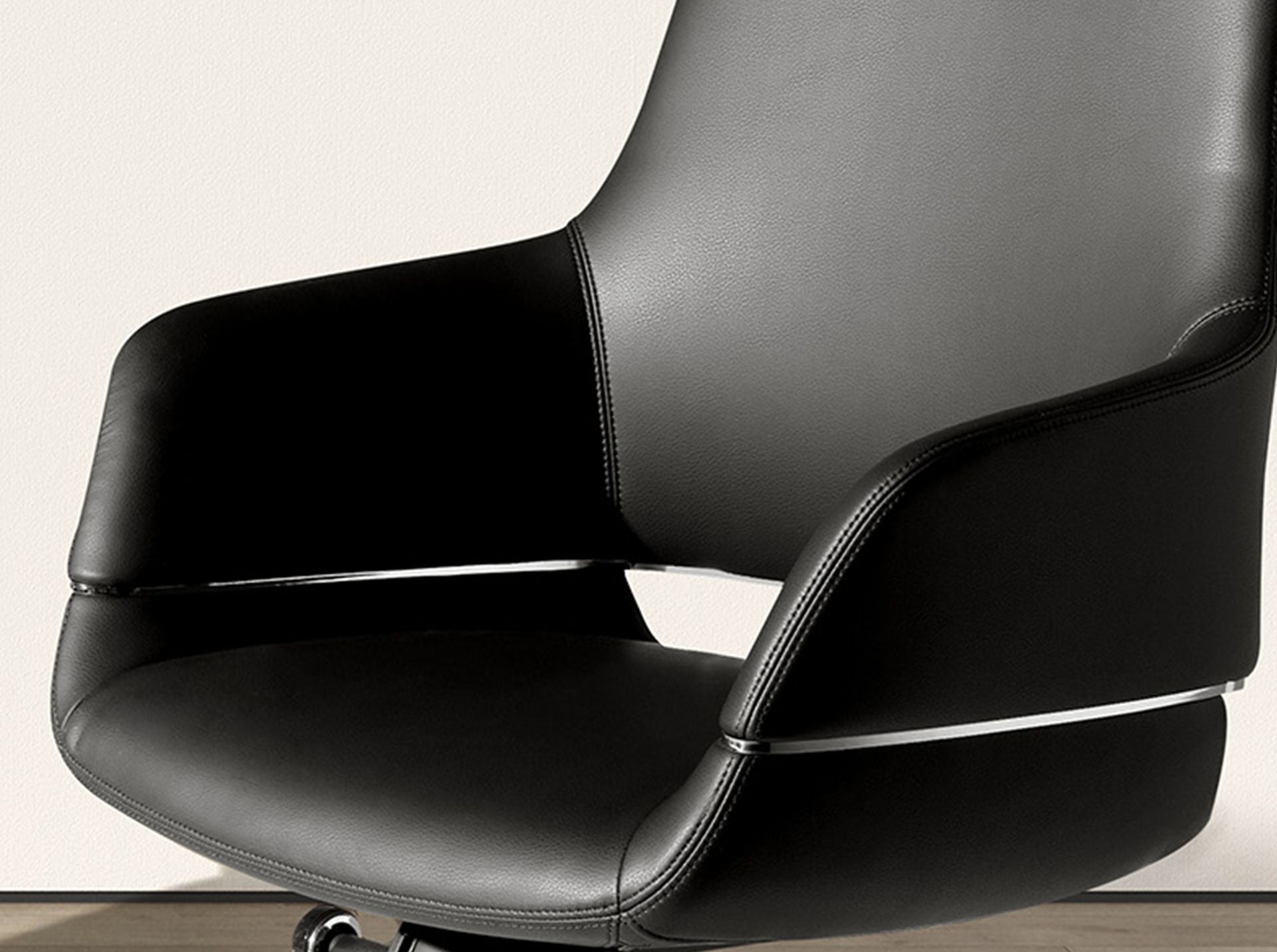 Black faux leather swivel office chair