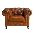Poltrona Chester in pelle marrone cognac