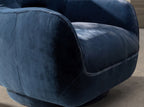 Poltrona girevole in velluto blu scuro