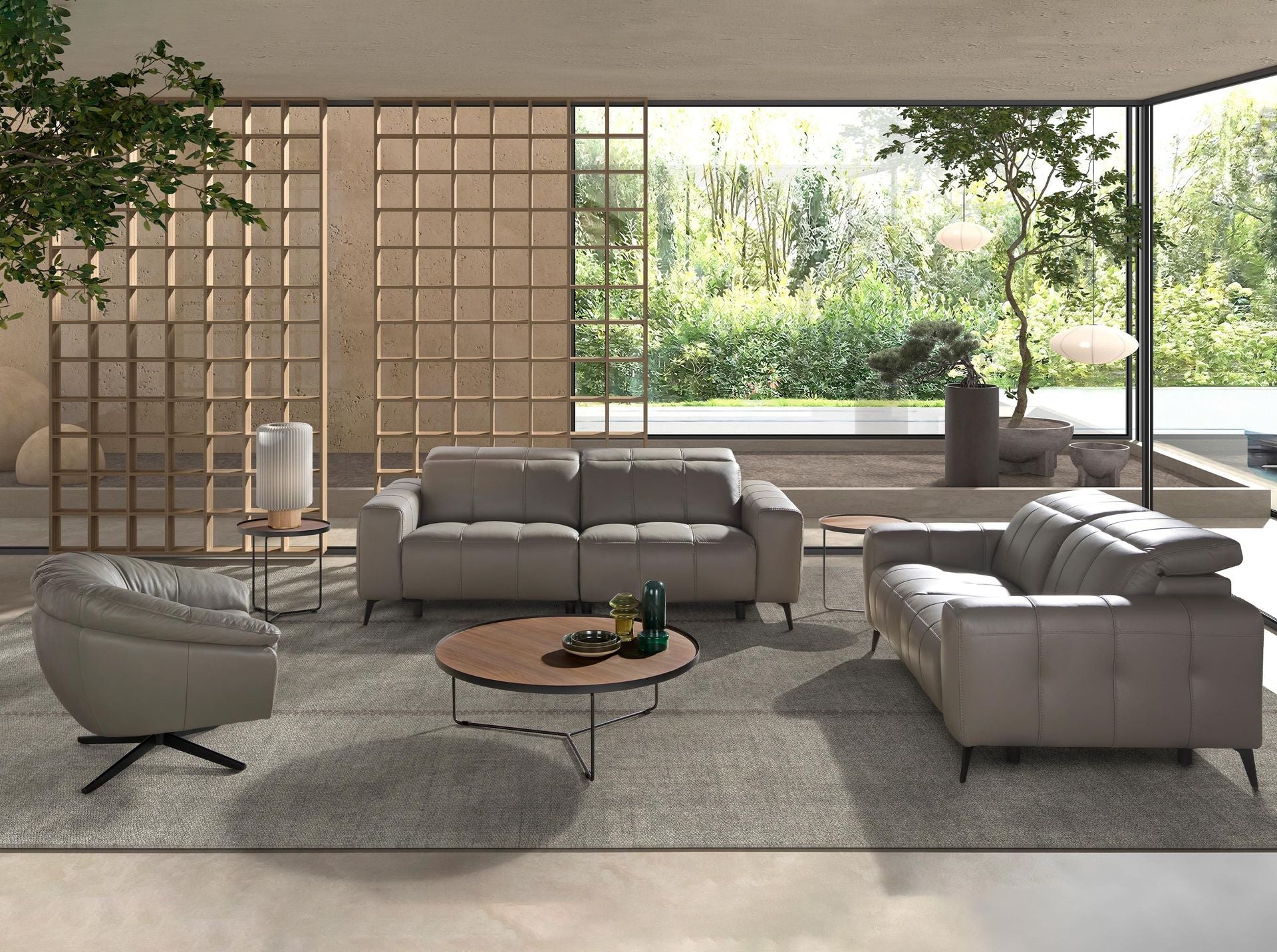 Three-seater reclining sofa in grey leather