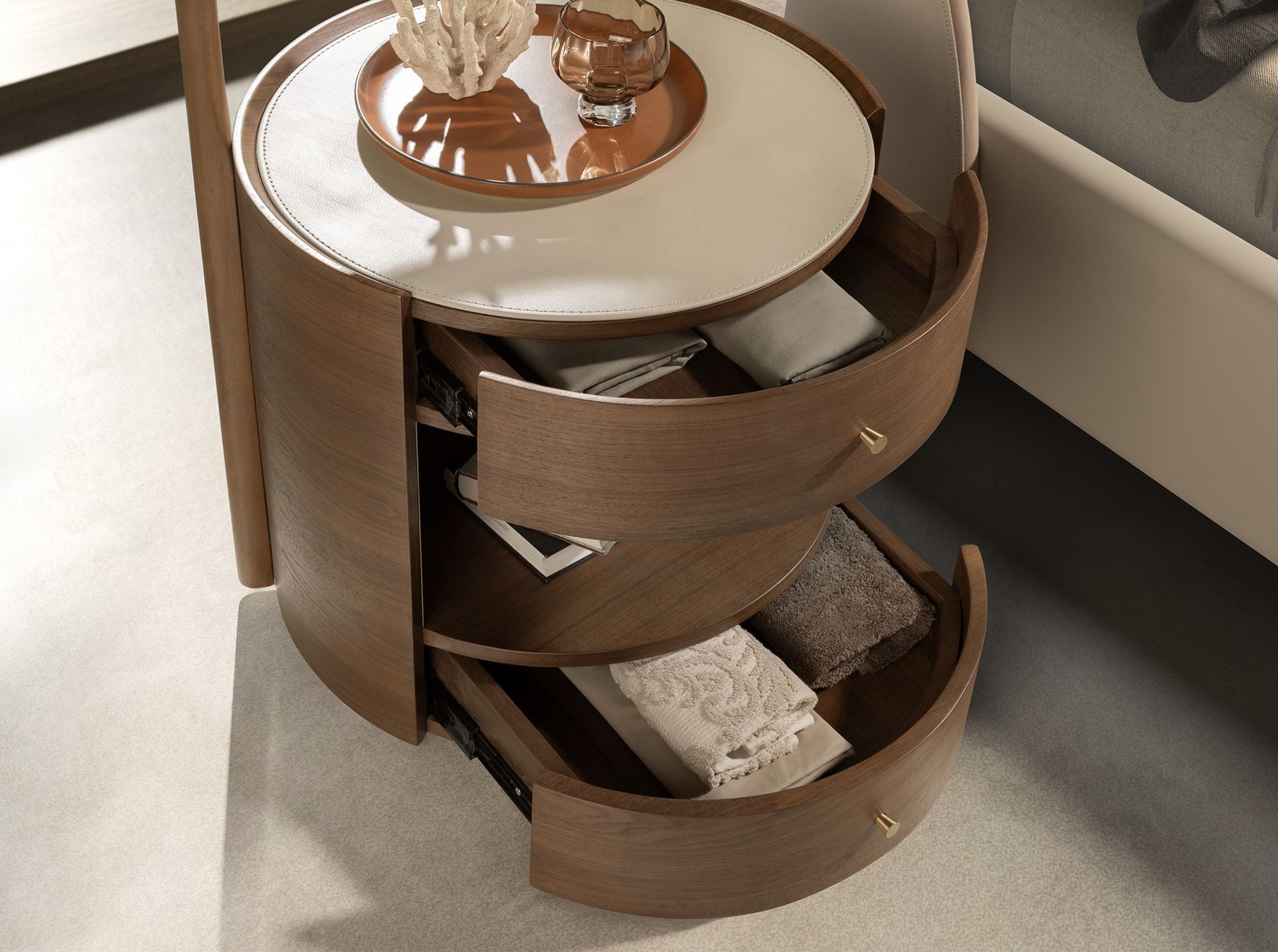 Walnut bedside table with cream leather top
