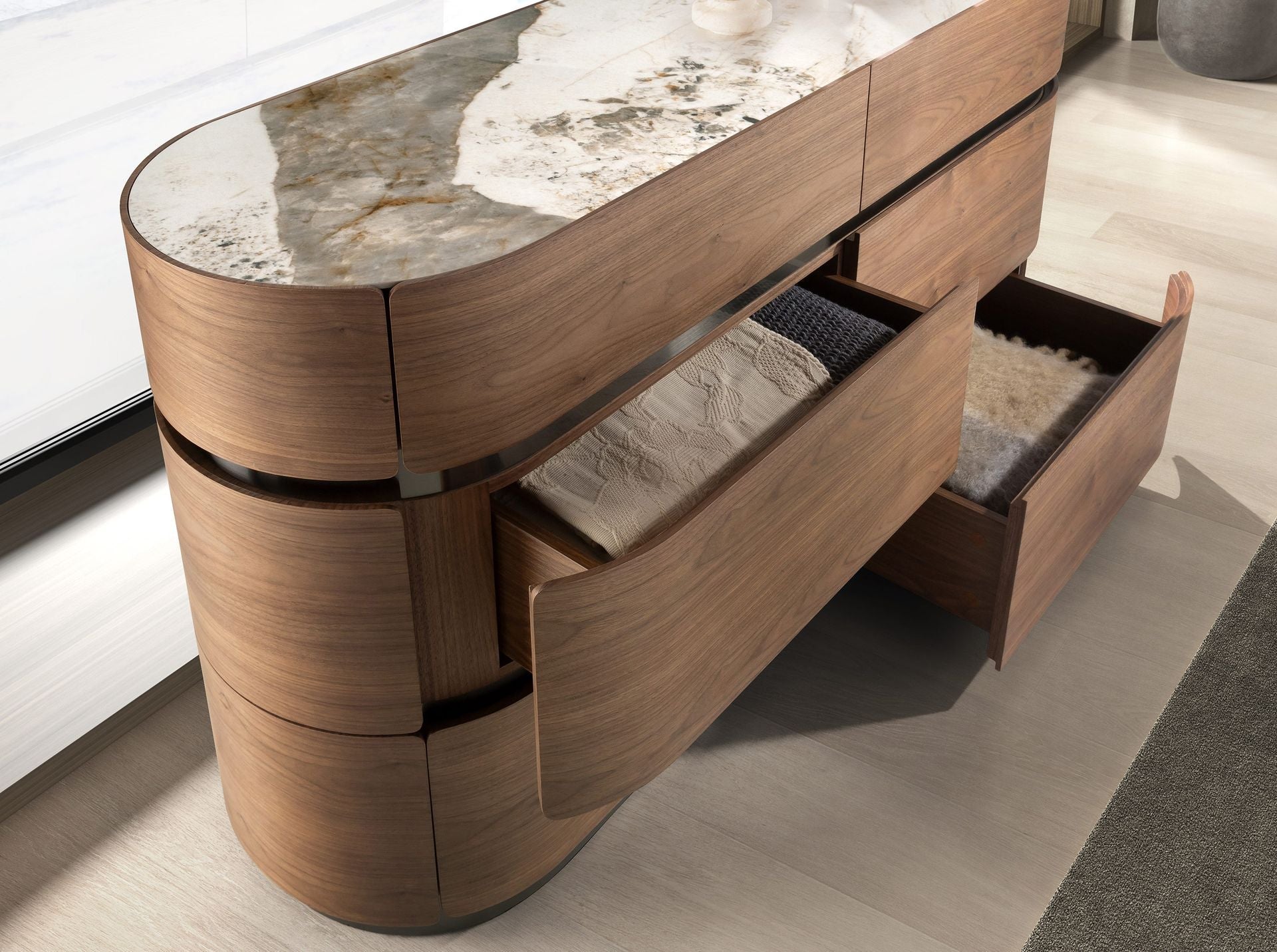 Chest of drawers in walnut, burnished steel base and porcelain marble top