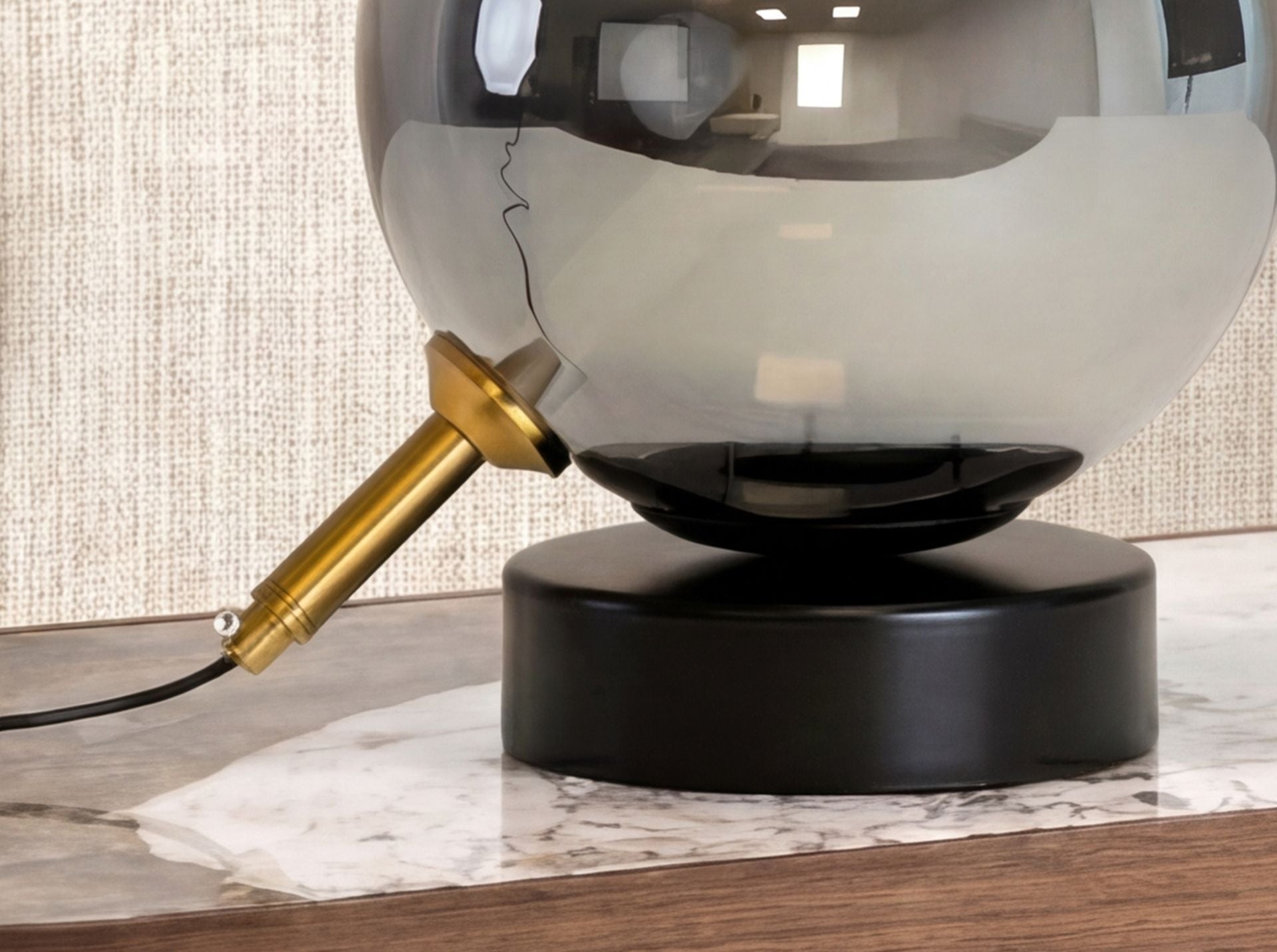 Grey smoked glass mirror effect and black steel table lamp