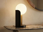 White glass and black steel table lamp