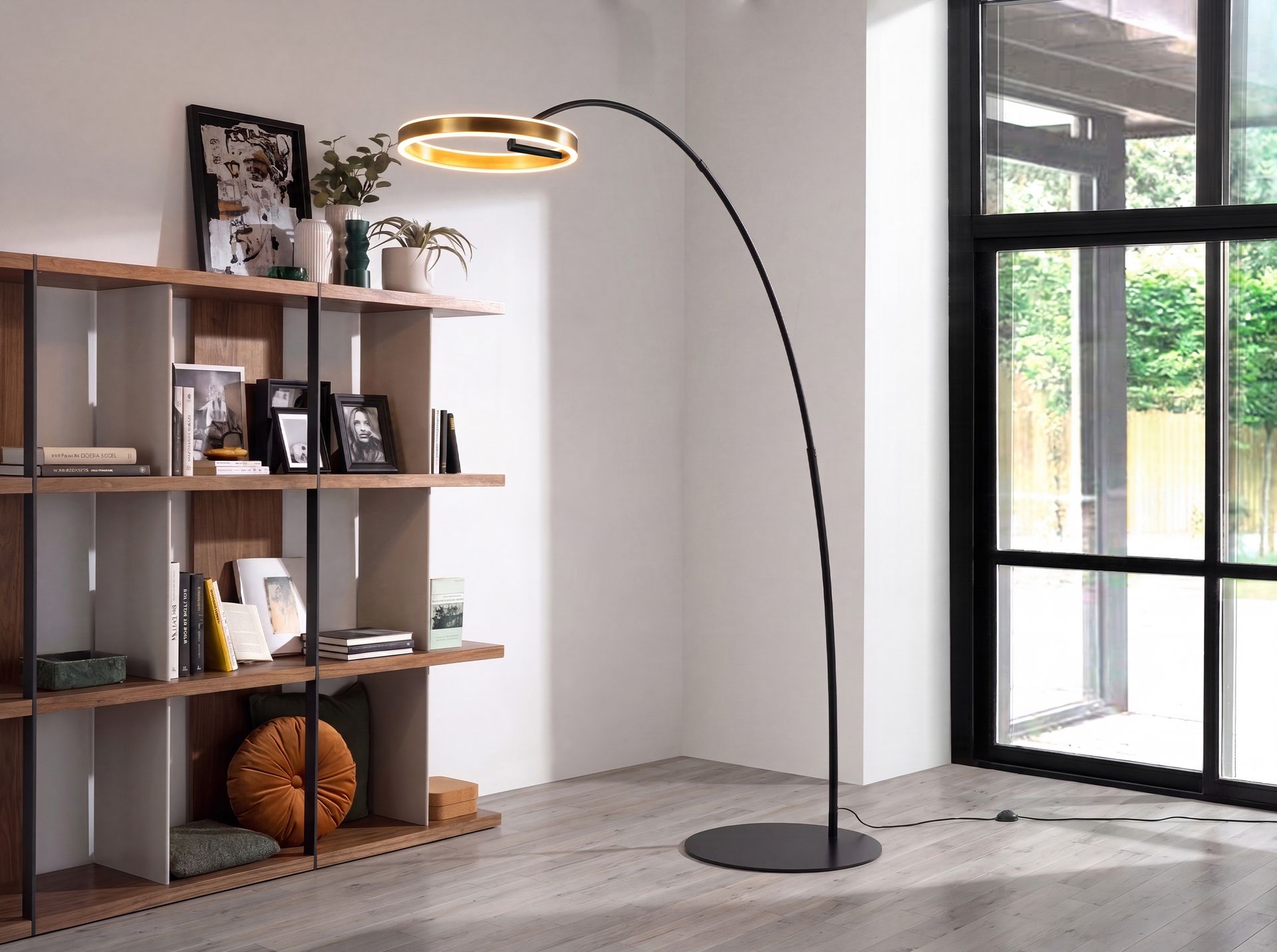 Polished golden steel and black steel floor lamp