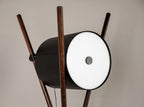 Black faux leather and dark walnut wooden floor lamp