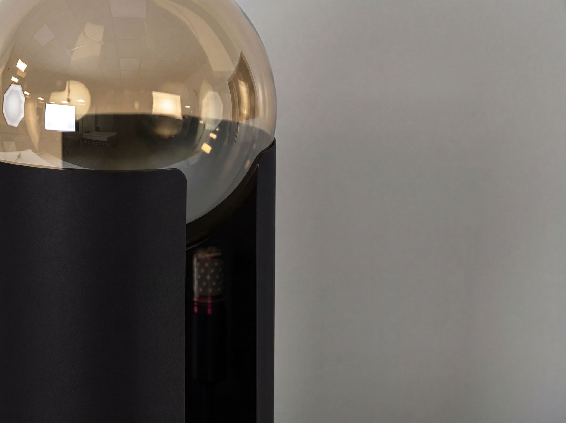 Amber smoked glass and black steel table lamp